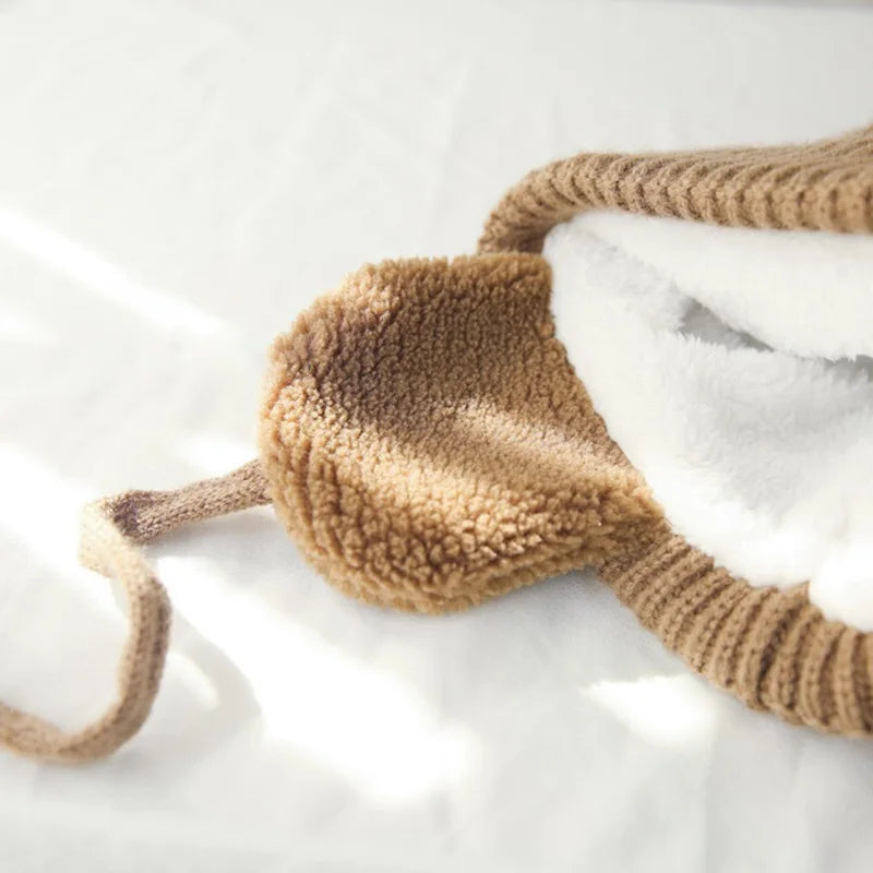 Snug knitted kids' hat with earflaps – warm winter hat