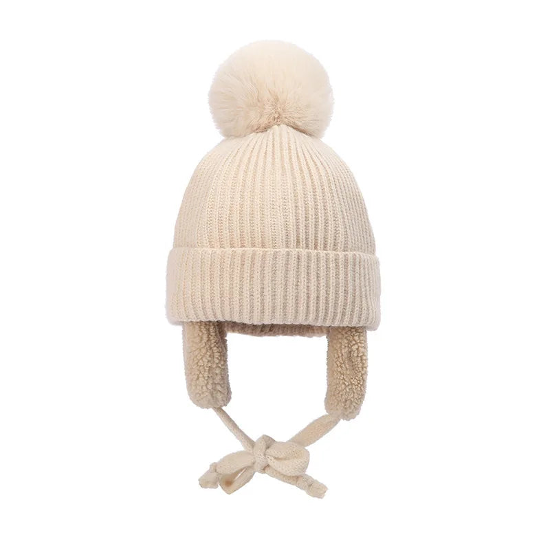 Snug knitted kids' hat with earflaps – warm winter hat