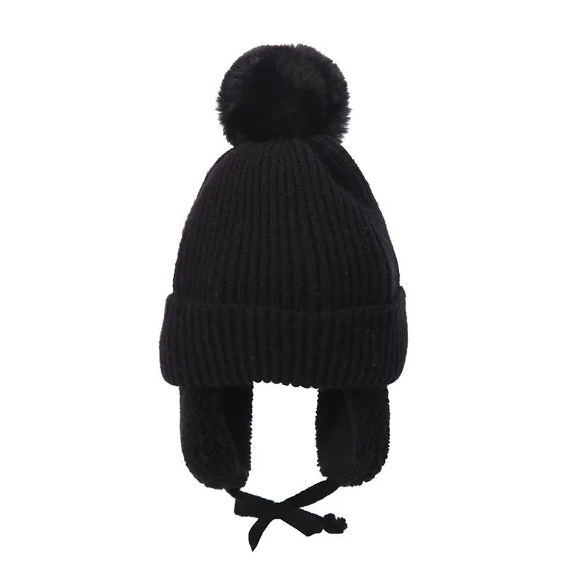 Snug knitted kids' hat with earflaps – warm winter hat