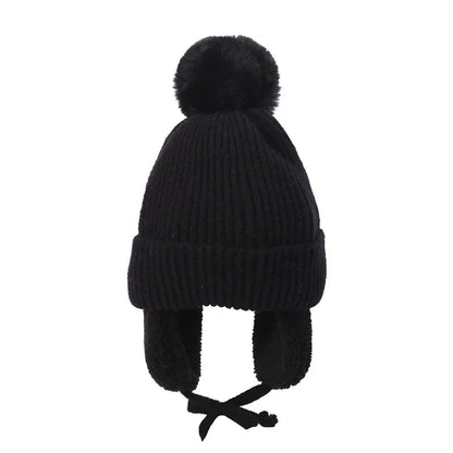 Snug knitted kids' hat with earflaps – warm winter hat