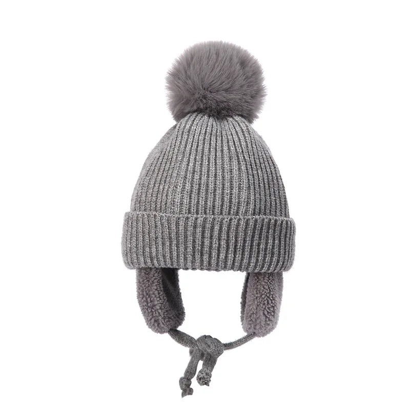 Snug knitted kids' hat with earflaps – warm winter hat
