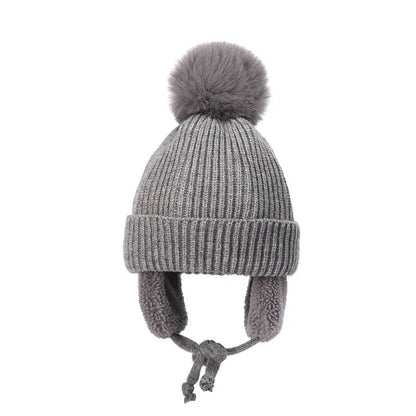 Snug knitted kids' hat with earflaps – warm winter hat
