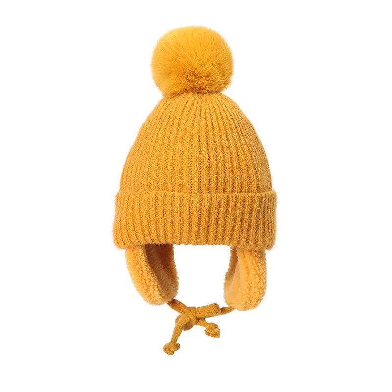Snug knitted kids' hat with earflaps – warm winter hat